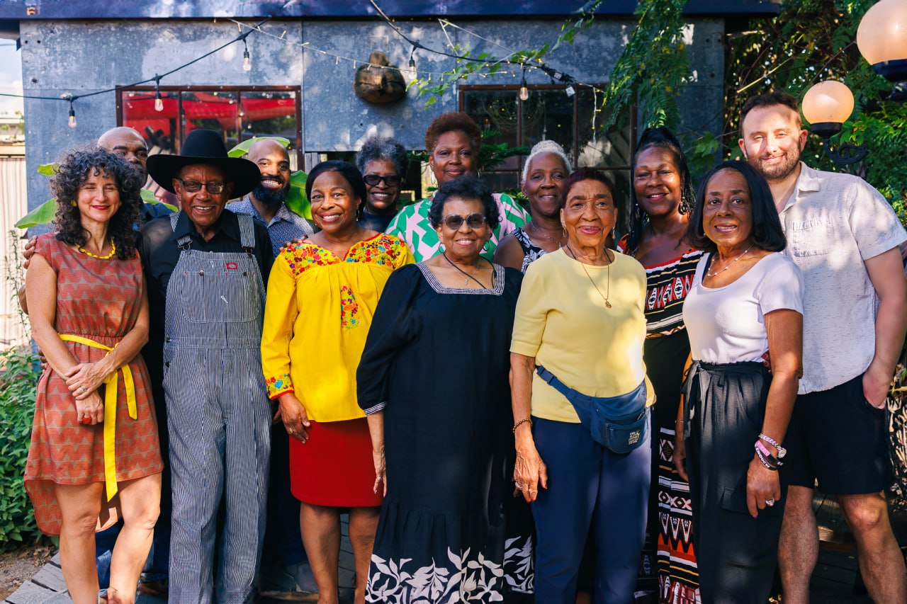 Members of the historic Rogers Washington Holy Cross neighborhood gathered together
